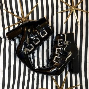 Black patent pointed toe buckle booties size 7